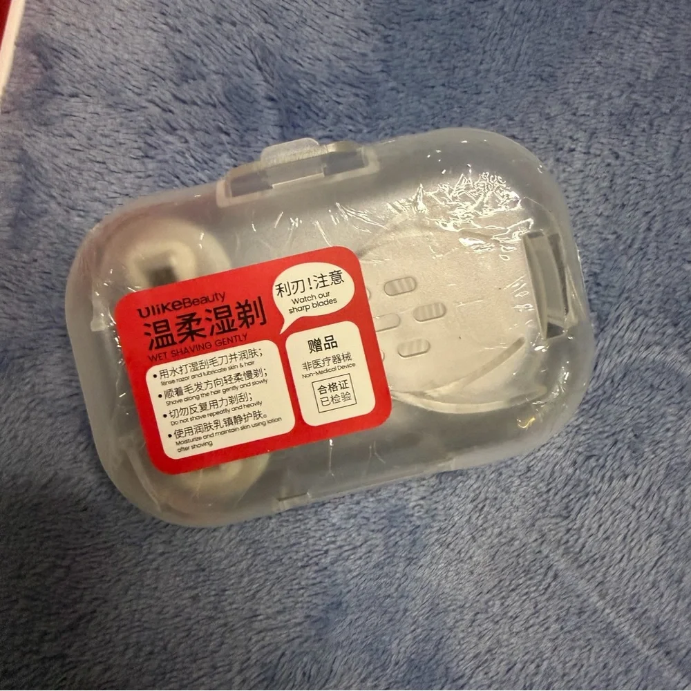 Ulike hair removal White Handheld Device in Original Box used 1 time‎